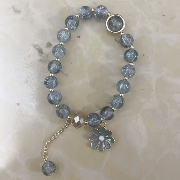 Women's elegant flower charm bracelet, a charming jewelry piece for daily wear.