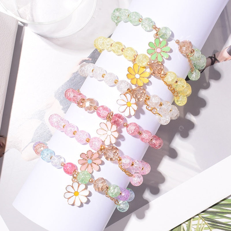 Sparkling women's flower charm bracelet with delicate floral details, chic jewelry.