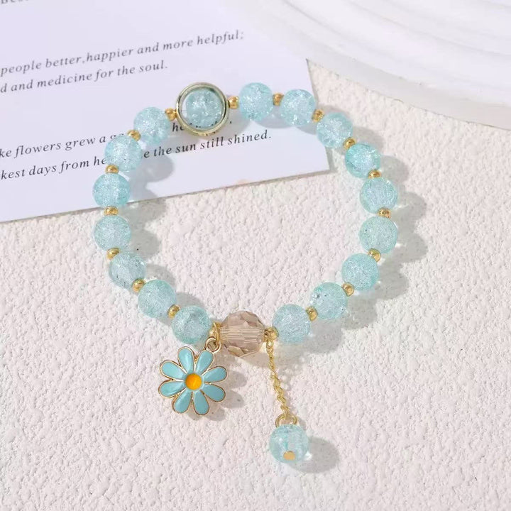 Sophisticated women's flower charm bracelet, a sparkling addition to any outfit.