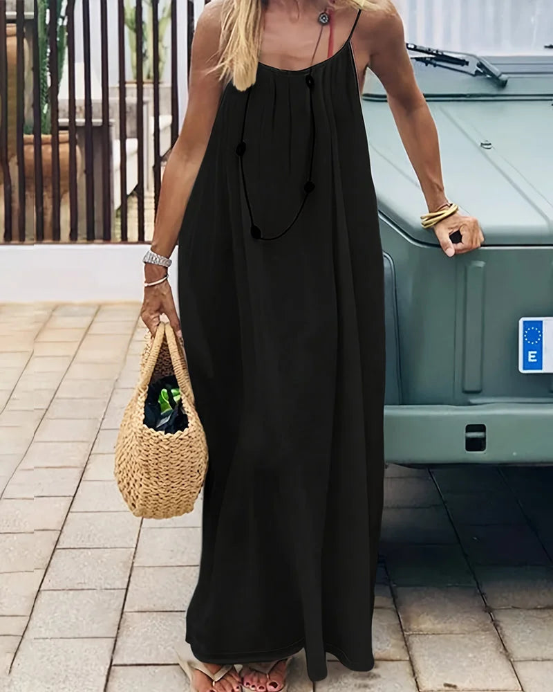 Sleeveless cami maxi dress for women, elegant flowing design, great as a slip dress or beachwear.