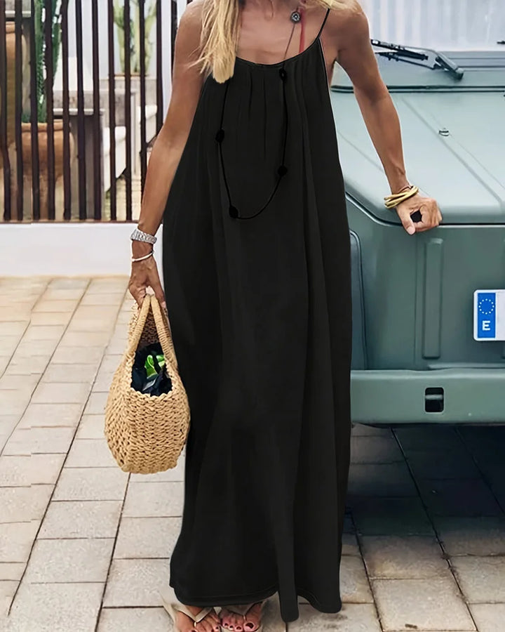 Chic women's sleeveless flowing cami maxi dress, perfect for summer fashion, resort wear & vacation style.