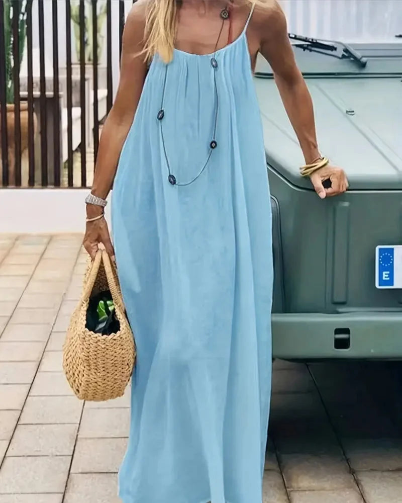Lightweight flowing cami maxi dress for women, elegant sleeveless design for comfortable summer fashion.