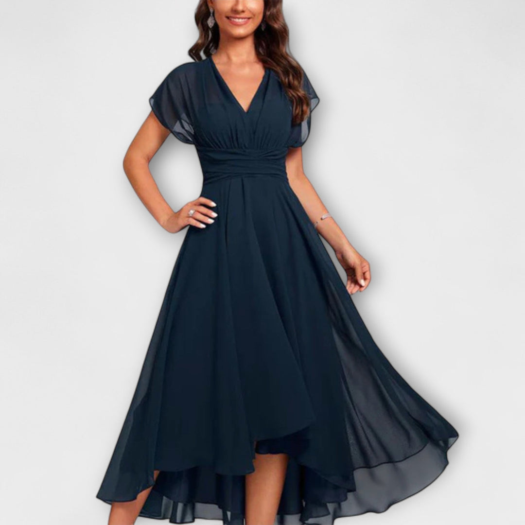 Elegant women's flowing midi dress, A-line V-neck with flutter sleeves, perfect for summer parties.