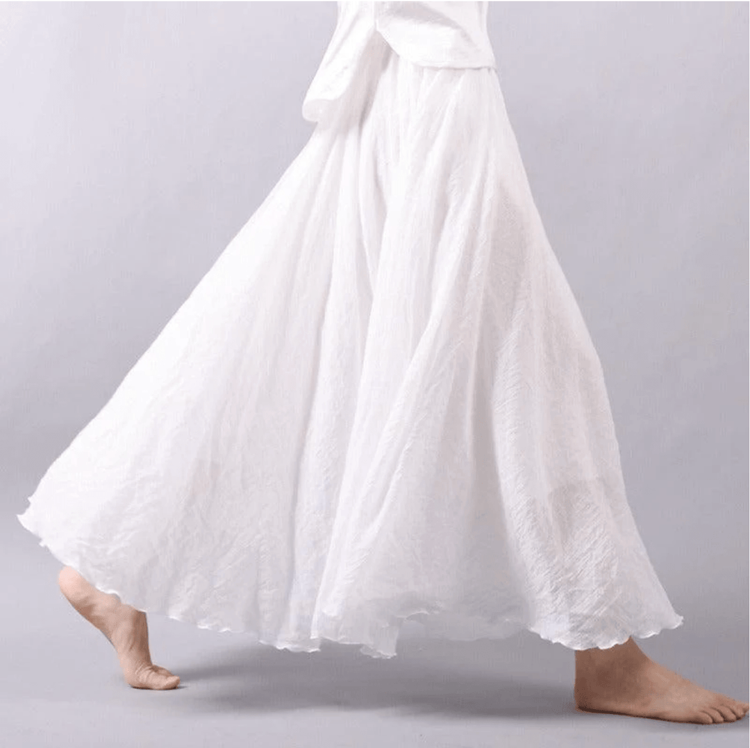Full-length women's bohemian maxi skirt, capturing its light, airy fabric and summer fashion appeal.