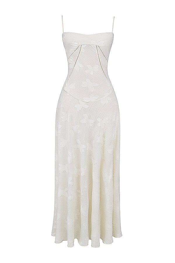 Ivory elegant sleeveless flowy maxi dress for women, ideal for daytime occasions, summer, or chic events.