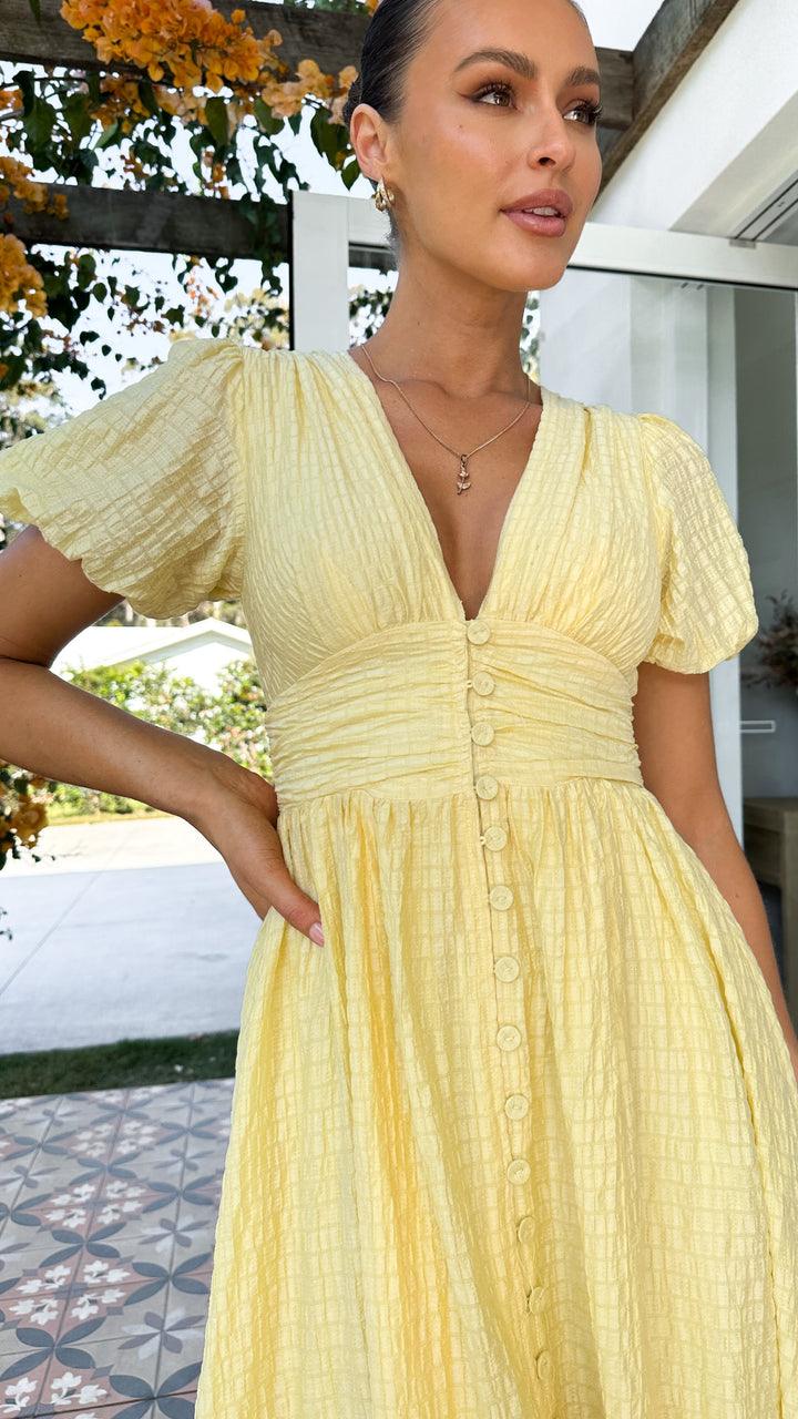Elegant women's long evening dress, a beautiful flowy button-front design for sophisticated occasions.