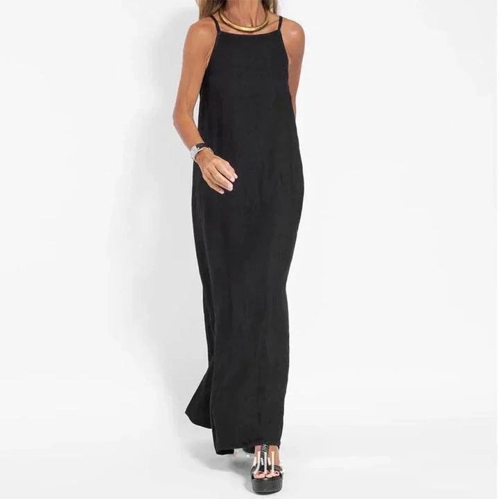 Casual flowy maxi slip dress for women with stylish side slits, ideal for comfortable summer day wear.