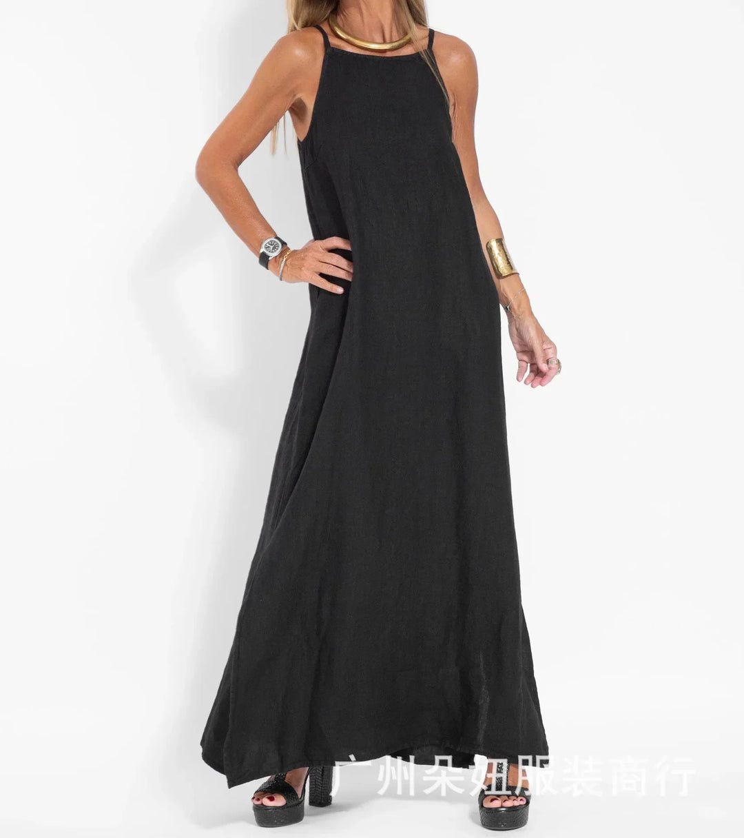 Vacation-ready women's flowy maxi slip dress with side slits, elegant and breathable for summer travel.