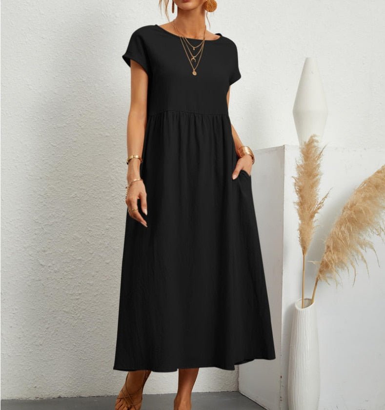 Elegant women's flowy maxi summer dress, perfect for breathable comfort & casual holiday wear.