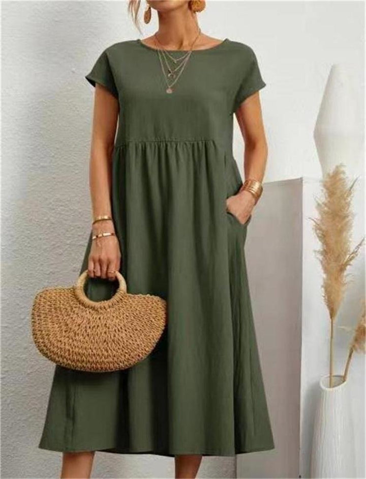 Essential women's flowy maxi summer dress. Breathable, comfortable & elegant for versatile seasonal style.