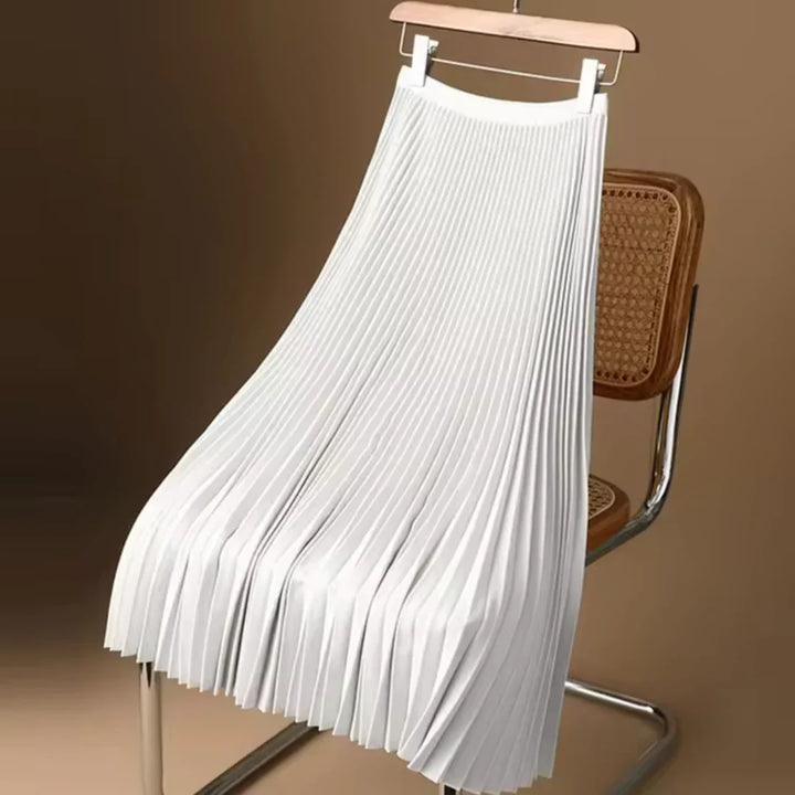 Classic women's elegant pleated midi skirt. A versatile, flowy piece for chic all-season style.