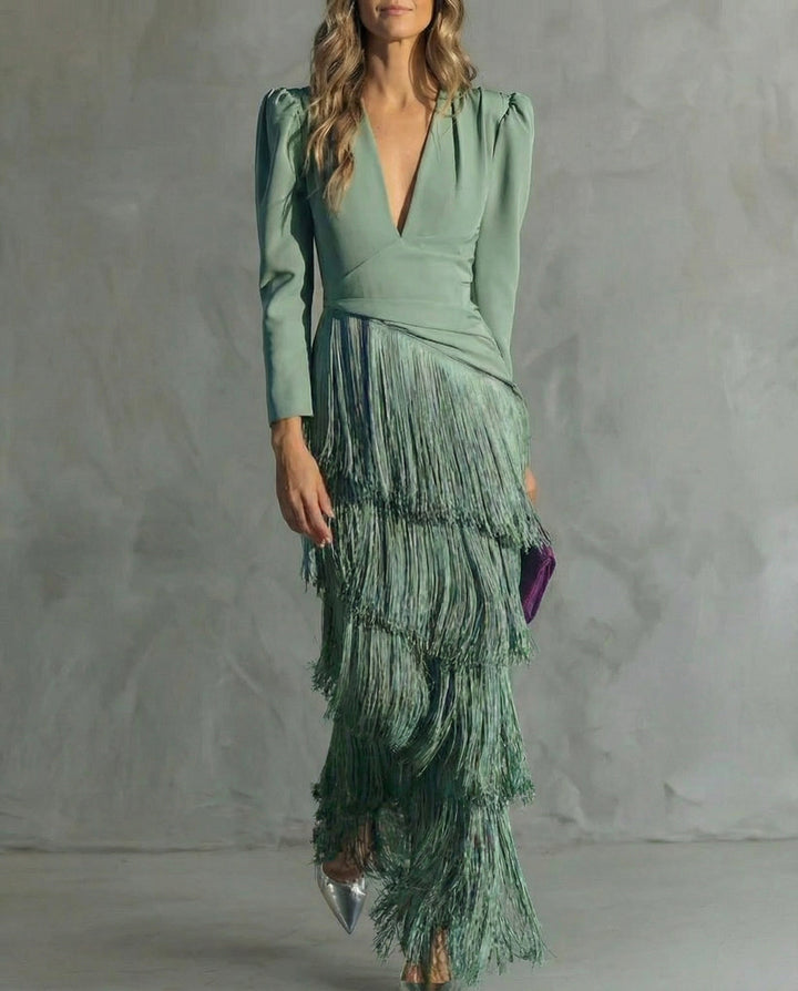 V-neck flowy long sleeve midi dress for women, adorned with stylish fringe for a sophisticated look.