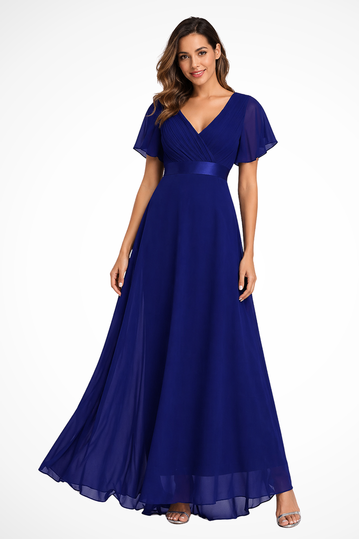 Flowy elegant women's maxi dress with flutter sleeves & v-neck, comfortable for a wedding guest or party.