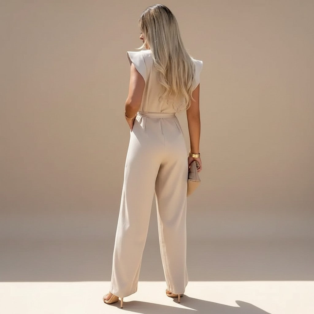 Comfortable women's wide leg jumpsuit featuring elegant flutter sleeves & a stylish waist tie.