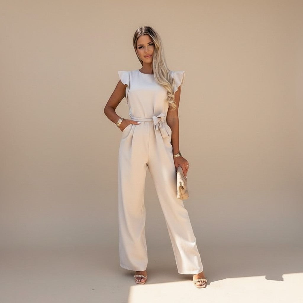Chic one-piece women's flutter sleeve wide leg jumpsuit, offering an elegant and flowy silhouette.