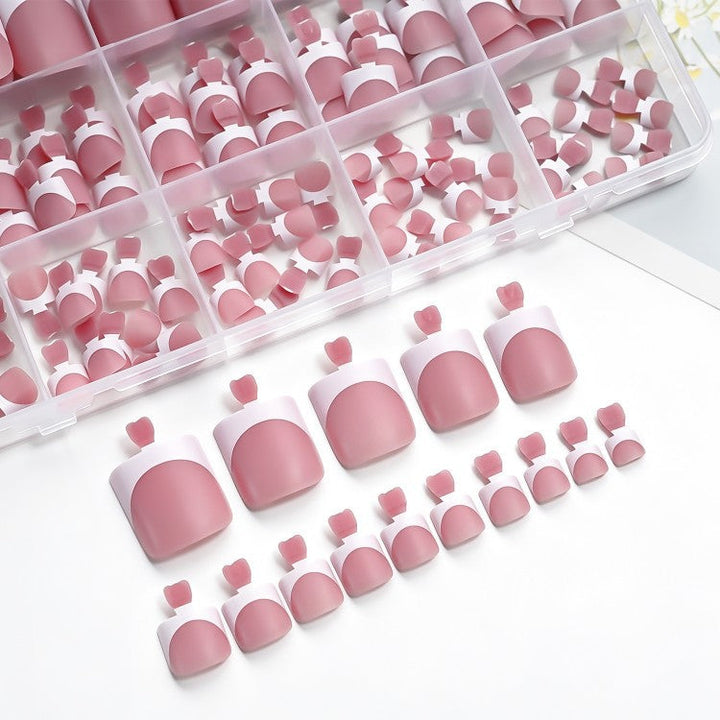 Premium nude pink French tip press-on nails, artificial nails for women, easy application elegant manicure.