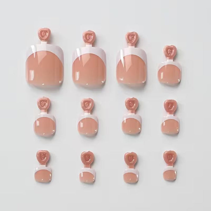 Classic French tip press-on toenails. White & clear design for a beautiful, elegant women's pedicure.