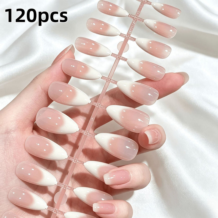 Elegant women's French tip soft gel nail tips for easy, salon-quality press-on manicures. Perfect artificial nails.
