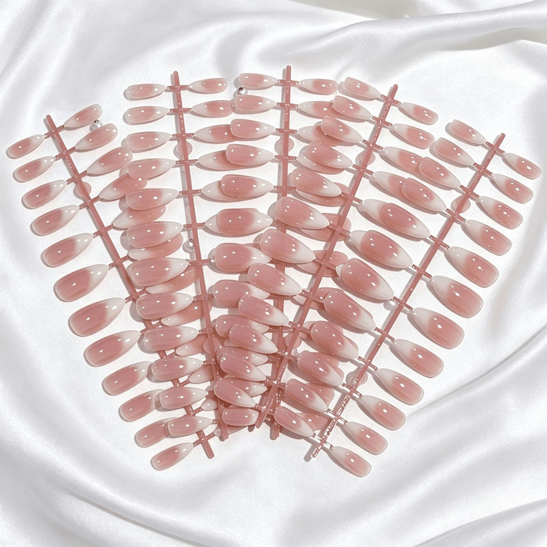 Press-on soft gel nail tips with classic French tips for women. Achieve beautiful, professional-looking gel manicures.