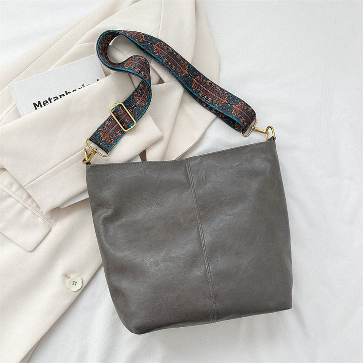 Elegant women's large leather tote bag, perfect as a versatile daily or travel companion.