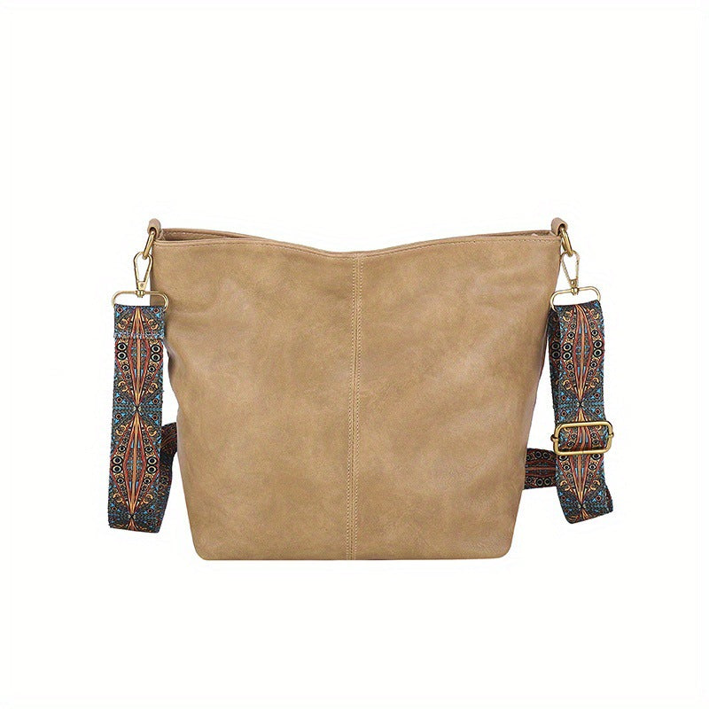 Genuine leather women's tote bag, elegant design, suitable for work and travel.