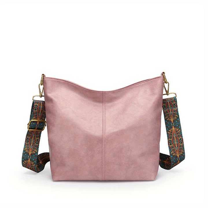 Classic women's leather shoulder bag, high capacity and durable for daily wear.