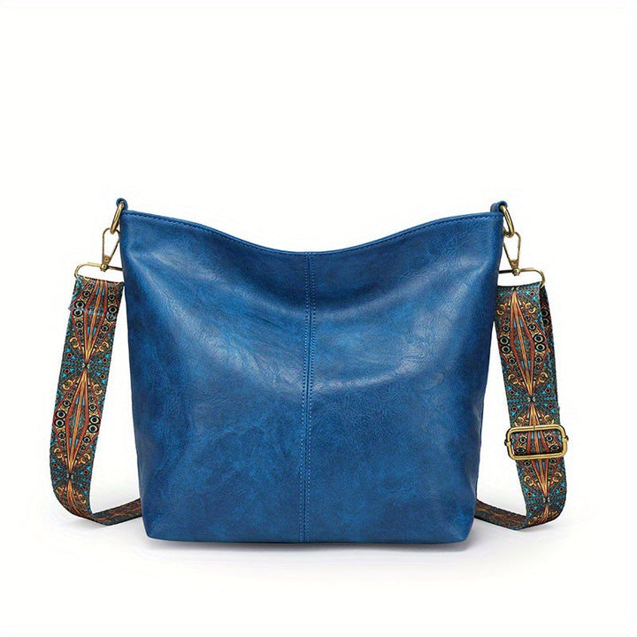 Chic women's genuine leather tote, offering large capacity for all occasions.