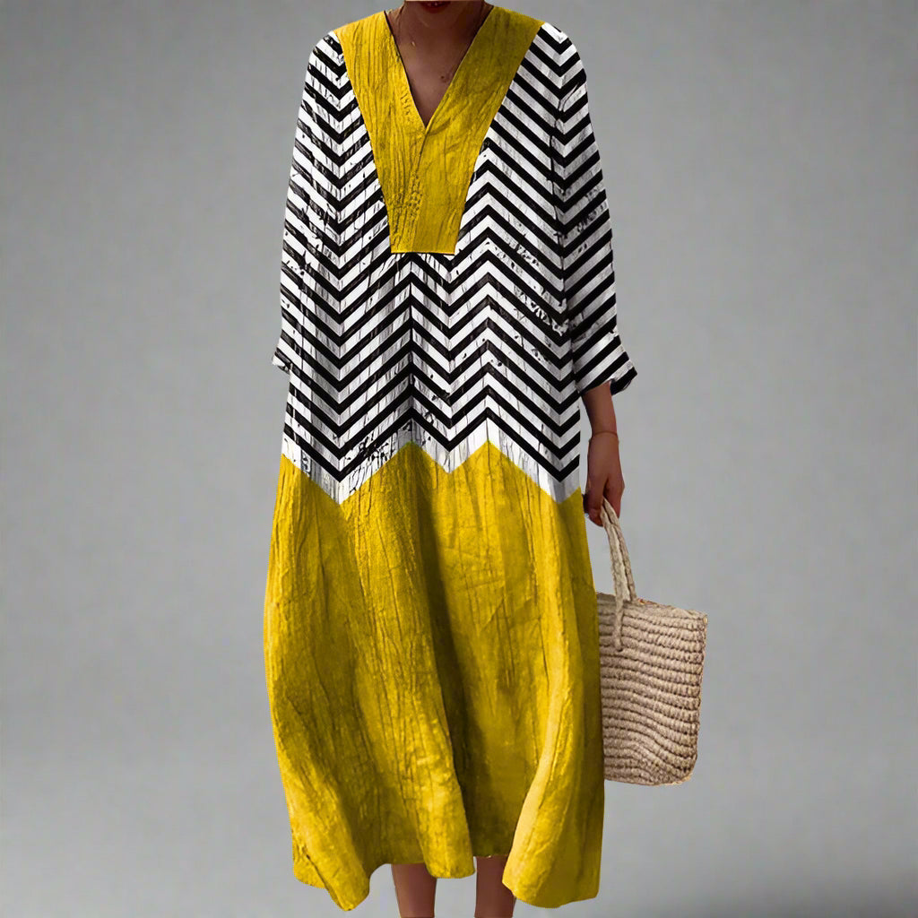 Elegant Women's geometric print maxi dress with long sleeves, perfect for summer vacation or casual day wear.