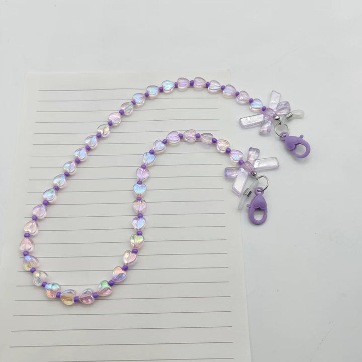 Decorative women's glasses chain with charming heart & flower details. Keeps reading glasses or sunglasses secure & stylish.