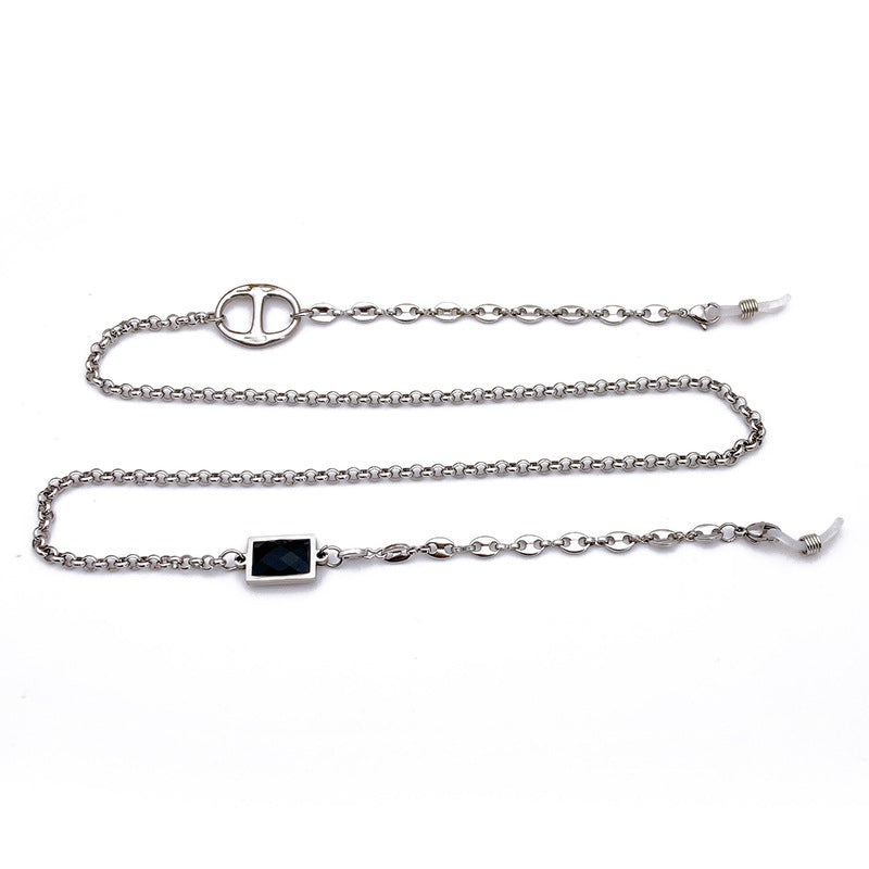 Women's elegant glasses holder chain, featuring a minimalist stainless steel rectangular pendant. A stylish eyewear accessory.