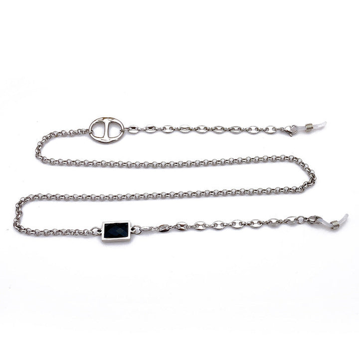Women's elegant glasses holder chain, featuring a minimalist stainless steel rectangular pendant. A stylish eyewear accessory.