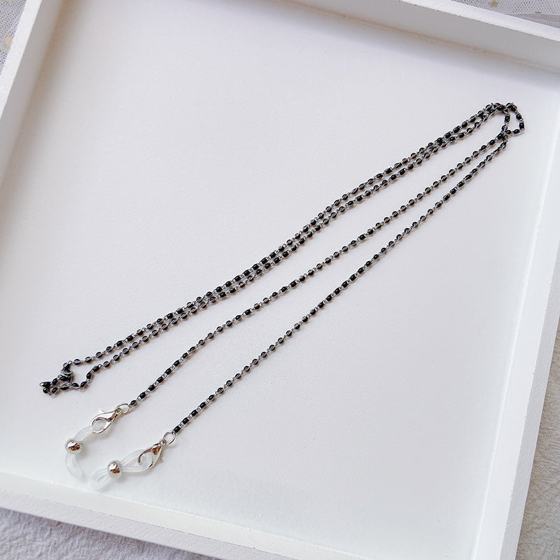 Dual-purpose women's necklace and glasses holder, a chic and functional fashion accessory for eyewear.