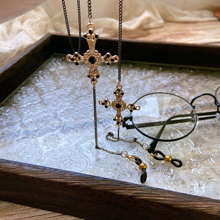 Elegant women's gold finish necklace with multiple sparkling stone pendants. Perfect fashion accessory or gift.