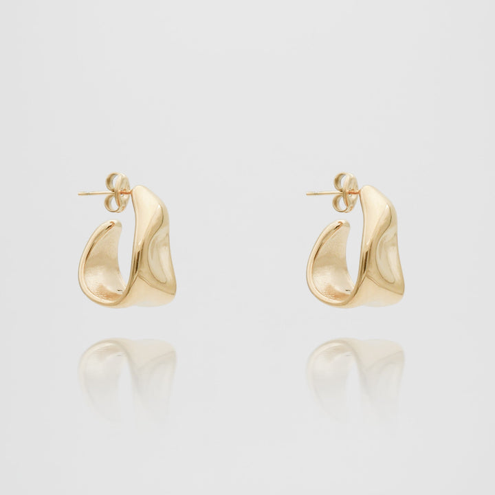 Elegant women's gold textured half hoop earrings, a chic fashion accessory.