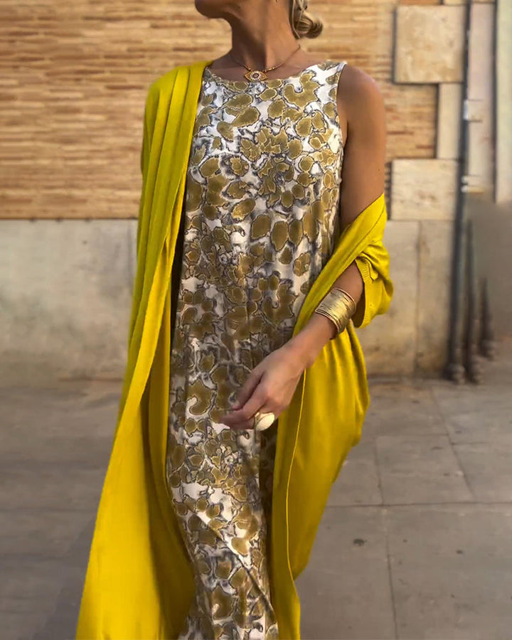 Chic golden maxi dress for women, ideal for summer parties & elegant evening wear. Flowing design for a flattering look.