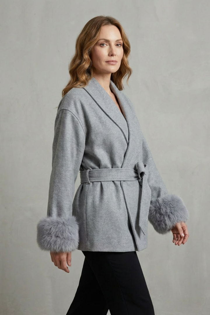 Sophisticated women's grey belted wrap coat, designed with a chic faux fur trim for elegant outerwear and comfort.