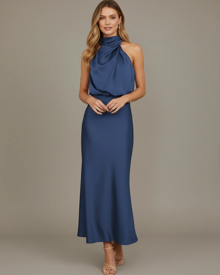 Chic women's summer formal dress: a comfortable halter cowl neck slip midi, ideal for events.