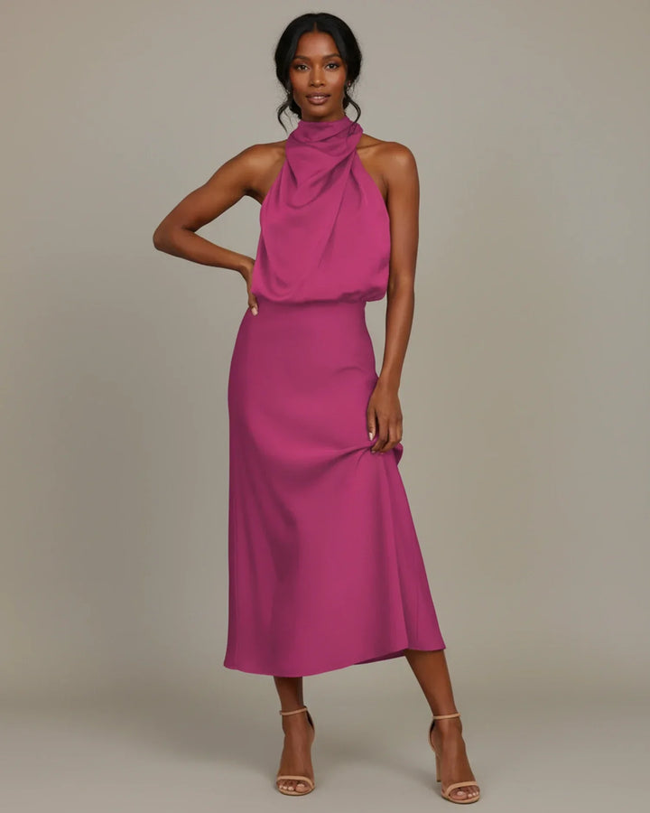 Perfect women's wedding guest attire: a chic halter cowl neck slip midi dress, comfortable & stylish.