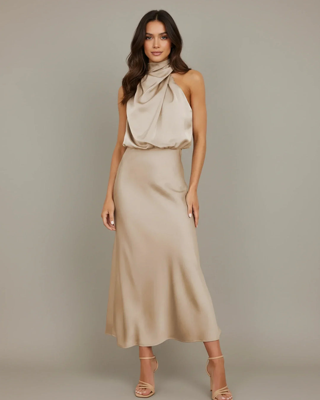 Stylish women's summer event midi dress; a halter cowl neck slip design ensures chic feminine fashion.