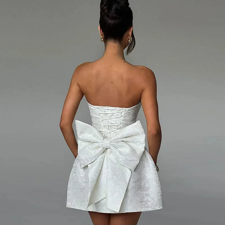 Sophisticated pink halter maxi dress, a backless evening gown for women's formal wear.