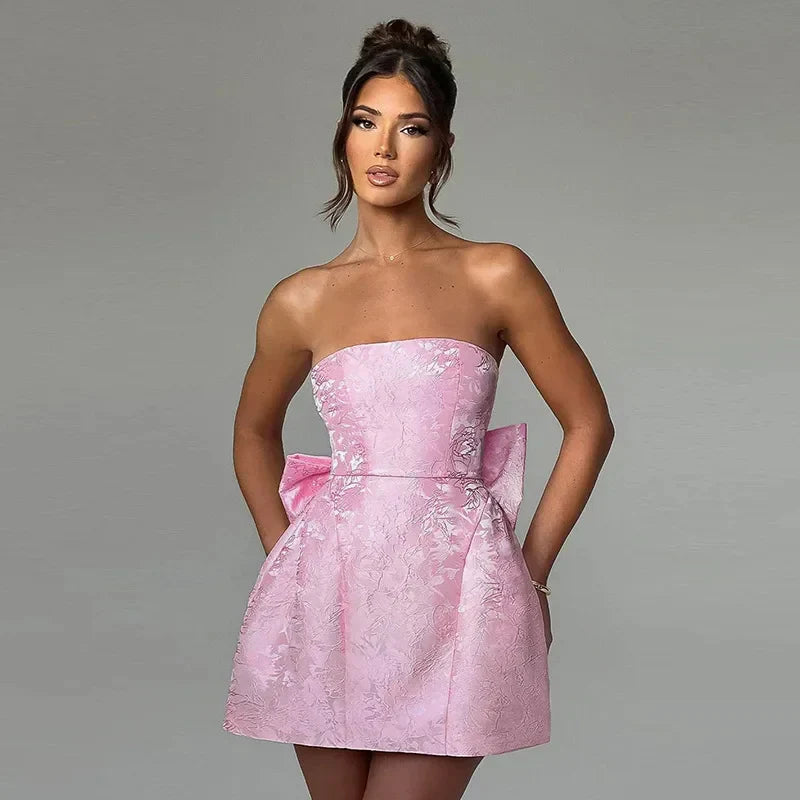 Backless halter evening dress for women, a sophisticated formal gown, available in pink & white.