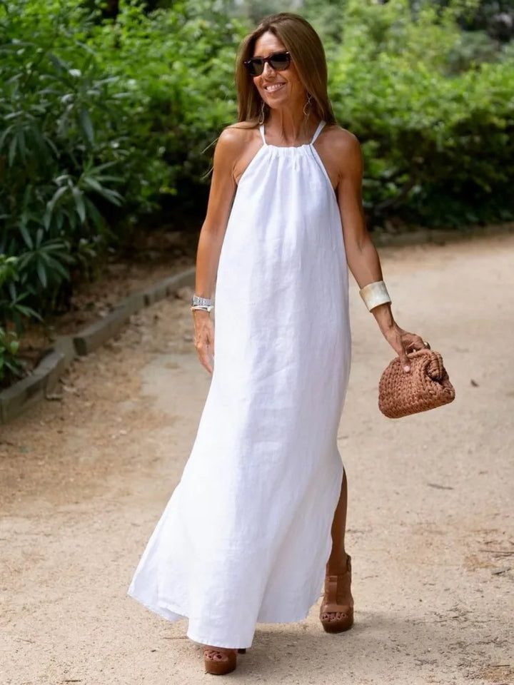 Casual women's halter maxi dress with loose fit, ideal for beach, vacation, or relaxed summer wear. Flowy fabric.