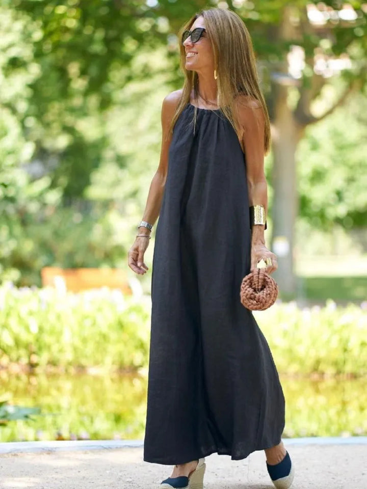 Beautiful women's elegant halter maxi dress. Sleeveless, loose fit, and flowy, great for summer events & parties.
