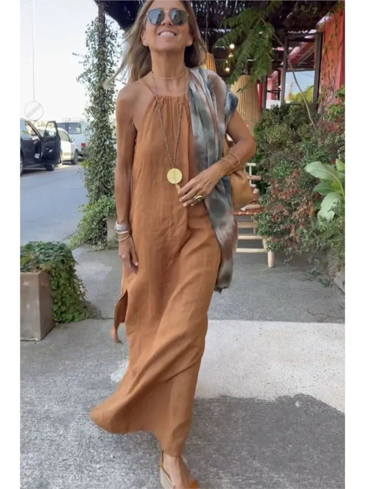 Women's elegant halter maxi dress, designed for summer events, parties, and vacations. Flowy, sleeveless, and comfortable.