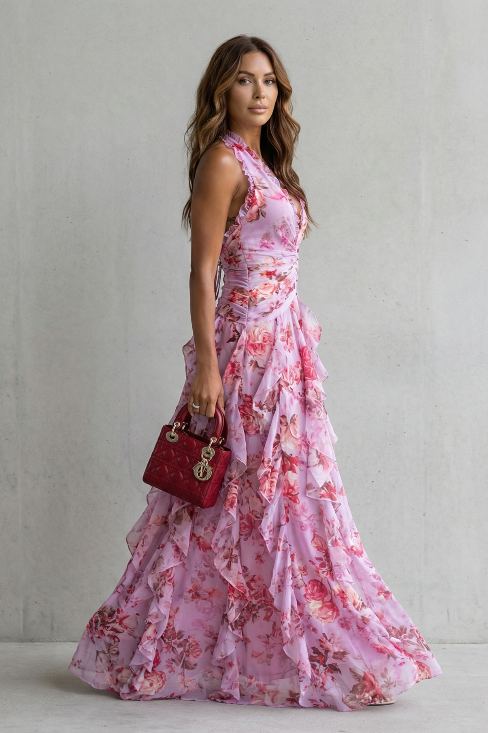Back view of a women's elegant halter maxi dress, highlighting its sleeveless design and flattering romantic fit.