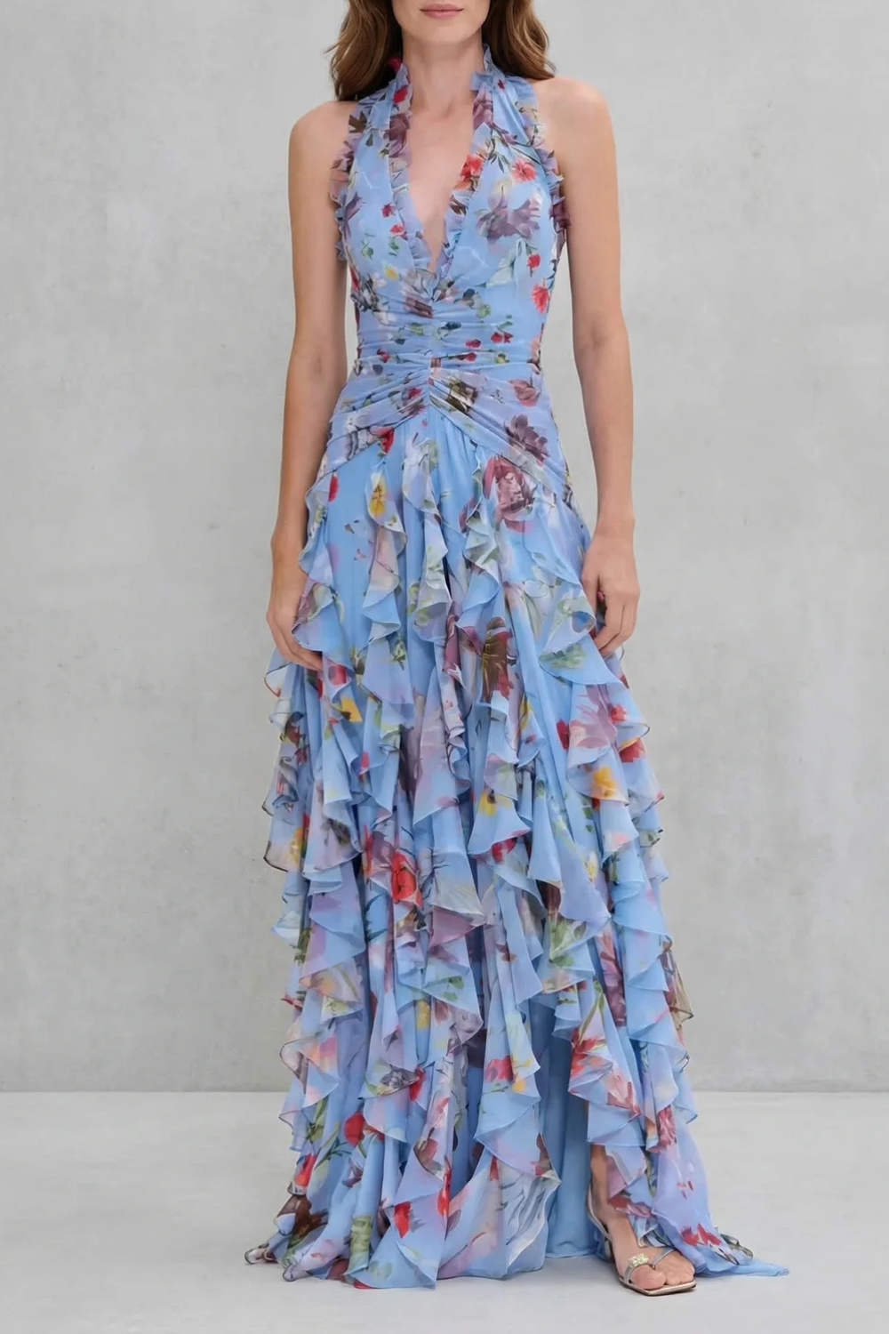 Romantic flowing elegant halter maxi dress for women, a beautiful sleeveless design perfect as an evening dress.