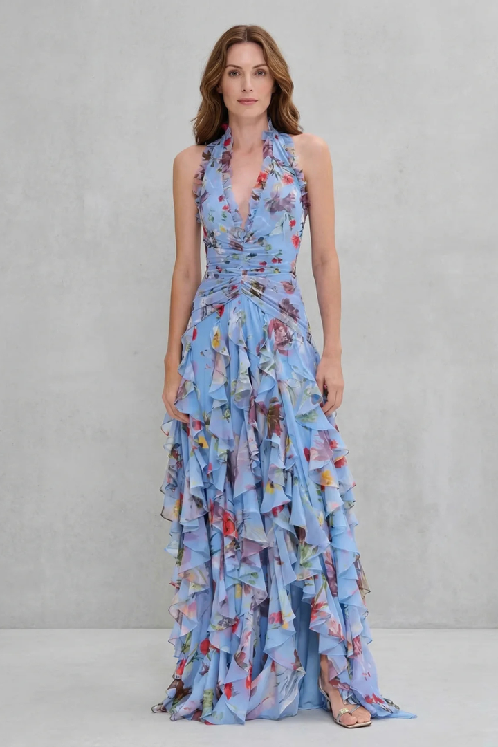 Full-length view of a women's elegant halter maxi dress, featuring a romantic flowing silhouette, perfect for summer.