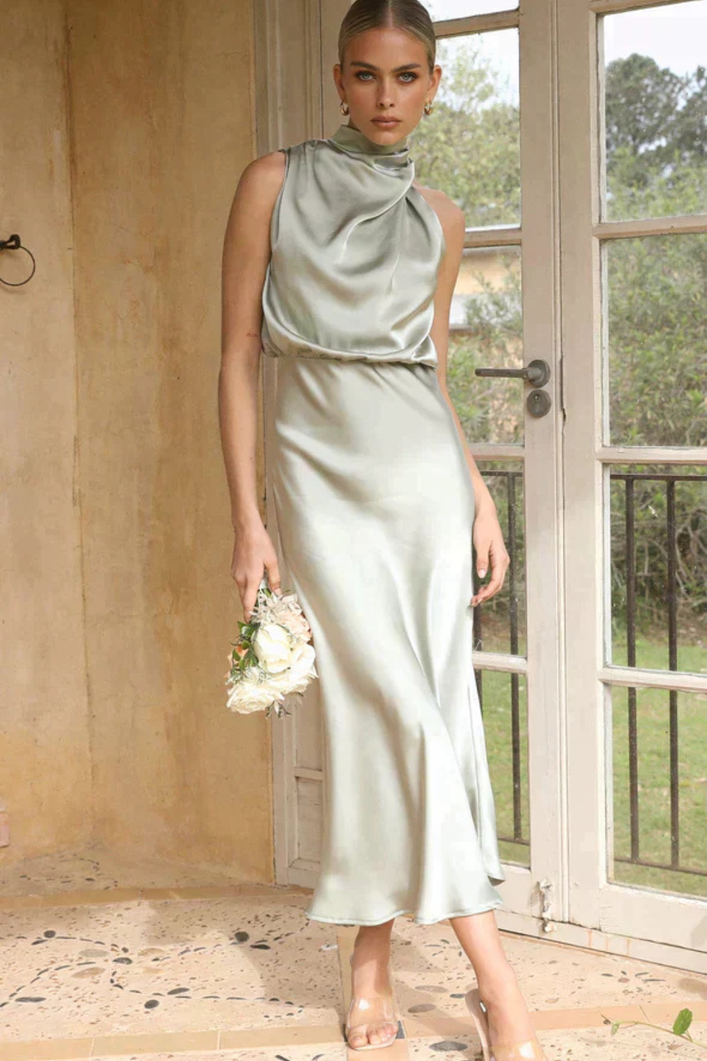 Formal women's midi dress featuring a sophisticated halter neck, great for parties & special events.