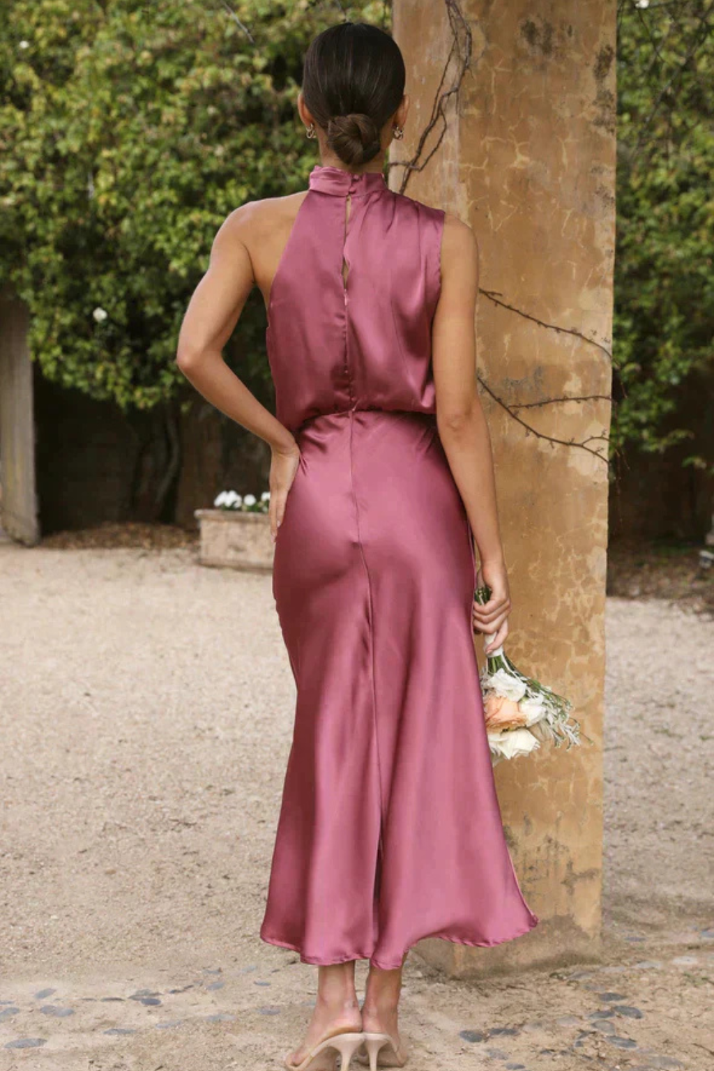 Party-ready women's halter neck midi dress, ideal for sophisticated evening events & celebrations.