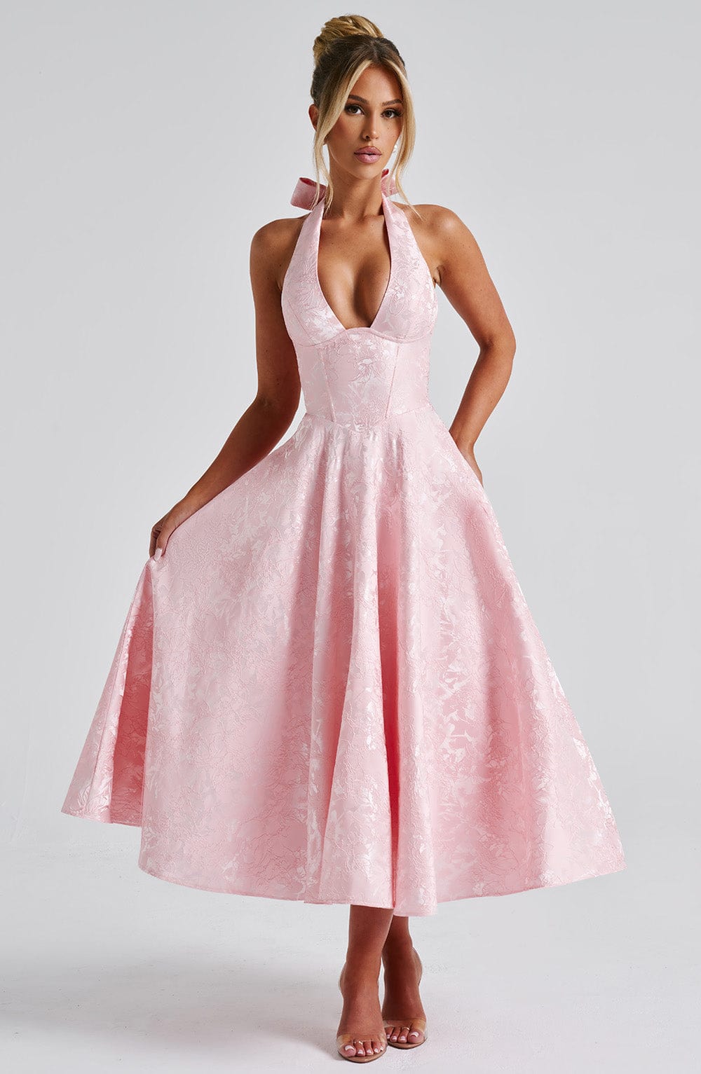 Elegant women's halter midi dress, perfect for wedding guests or evening events.